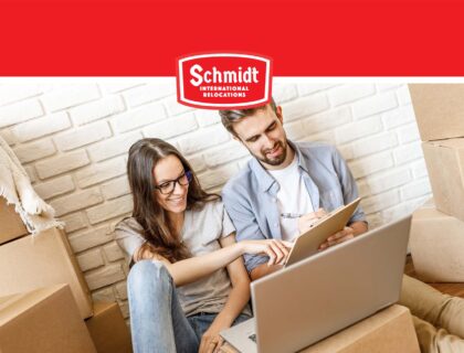 couple-packing-Schmidt-International-Relocations-logo.jpg