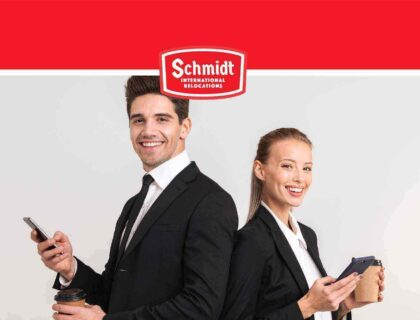 business couple Schmidt International Relocations Logo