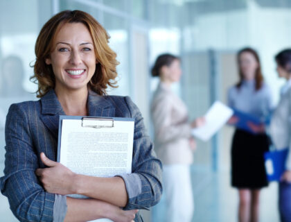 Woman smiling in an office
