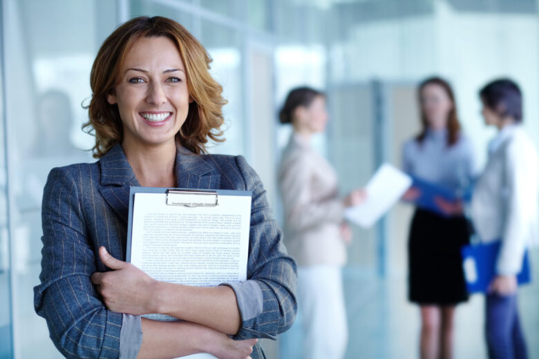 Woman smiling in an office