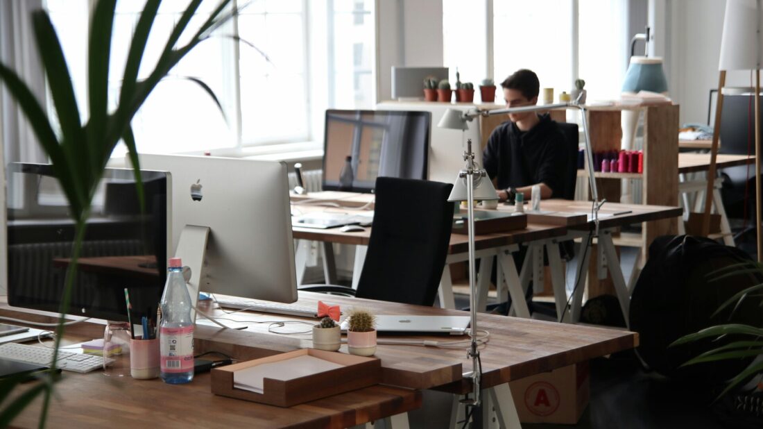 A young professional sitting in an office space