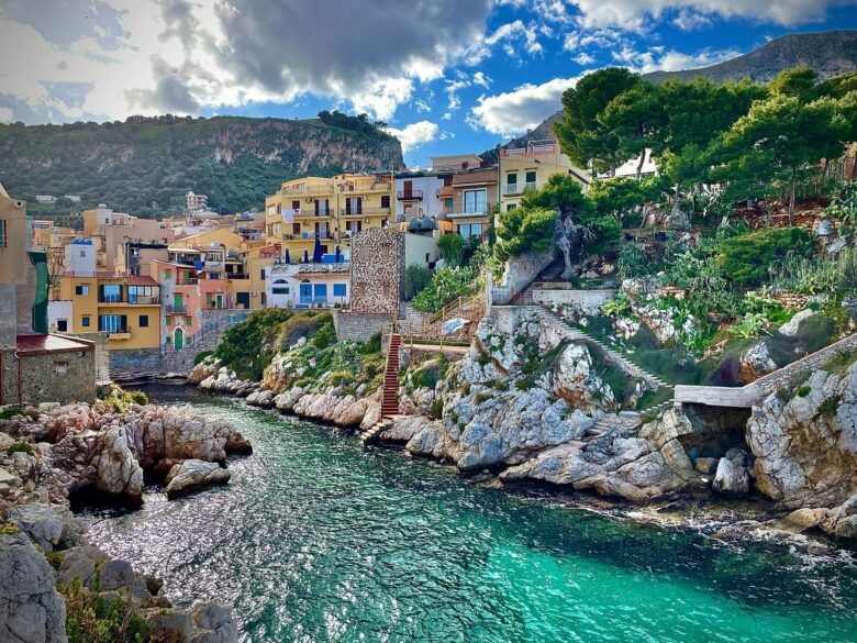 Scenic river flowing through a lush green hillside landscape.