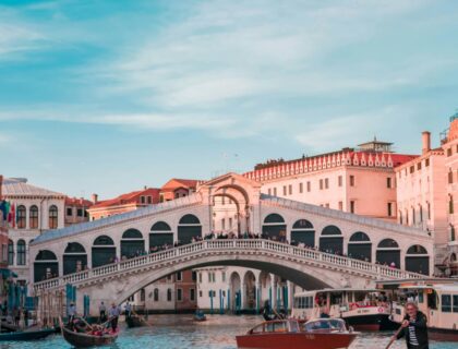 Historic Rialto Bridge spanning the Grand Canal in Venice Italy.