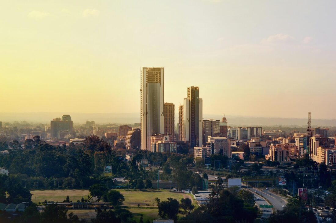 Panoramic view of the modern urban city skyline of Nairobi, Kenya under daytime skies.
