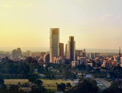 Panoramic view of the modern urban city skyline of Nairobi, Kenya under daytime skies.